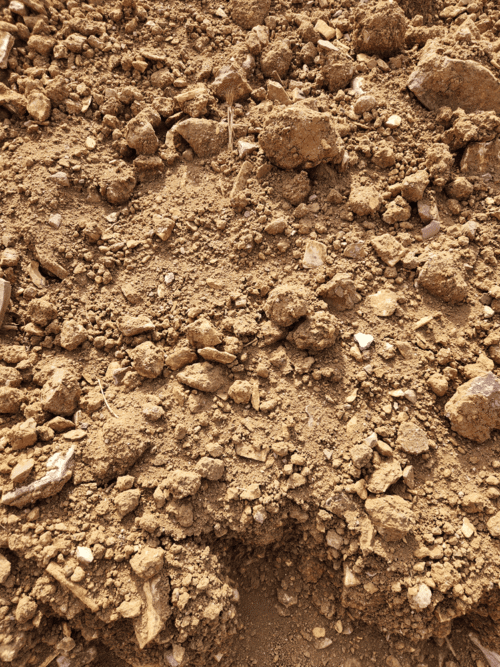 Heap of reddish Normal Filling (Sub-soil) for leveling ground in Pretoria.