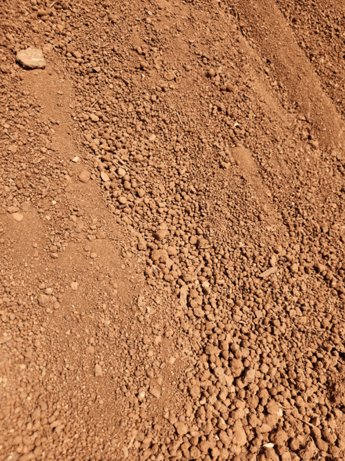 Heap of reddish Sifted Filling (clean soil) for landscaping in Pretoria.
